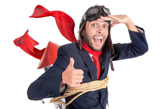 Businessman with home made rocket and googles ready for a challenge