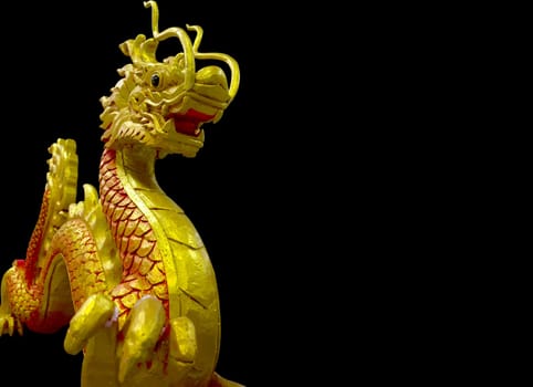 golden and red Chinese dragon on black background