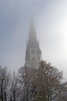 Church tower in fog