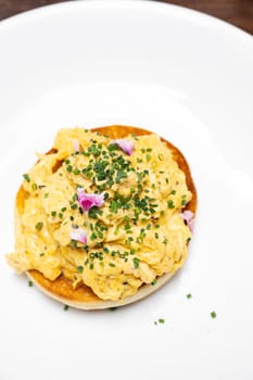 Scramble Egg with Truffle mushroom oil, international gourmet cuisine traditional breakfast of europe. Restaurant gastronomy food and drink consumerism concept.