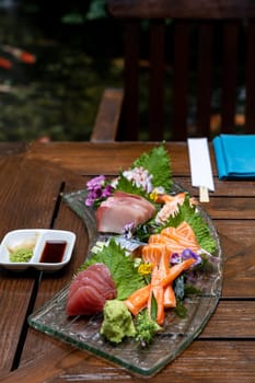 Variety of gourmet Sashimi set japanese freshness cuisine Salmon Tuna Otoro Saba Hamachi Octopus and shrimp meat. Restaurant gastronomy food and drink consumerism concept.
