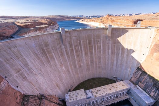 Glen Canyon Dam with Lake Powell in the Desert rural area of Page city Arizona, United States. USA Landmark environmental water resources reservoir and electricity concept.