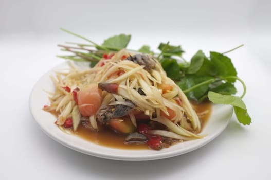 Som tam thai, green papaya salad on white background