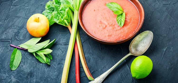 Summer cold rhubarb soup in a plate