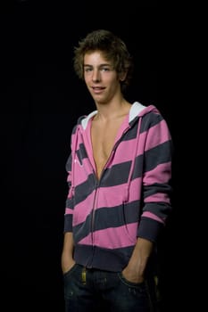 young casual man against a black background