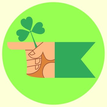 The hand indicates the direction of the green Patricks day holiday Shamrock Irish