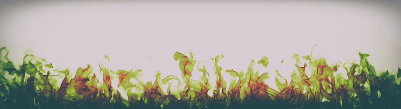green and red fire flames on white background