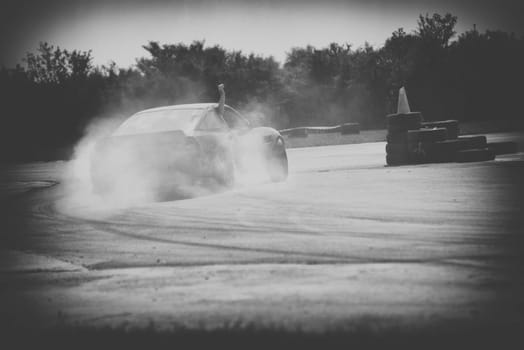 very fast car drift in black and white