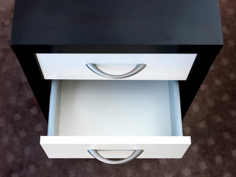 A close up shot of a set of office drawers