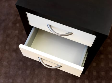 A close up shot of a set of office drawers