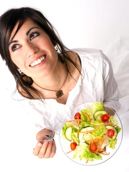 An attractive woman takes a moment to look at the camera before lunch