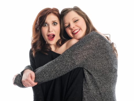 Girl is hugged by girlfriend and feels crushed