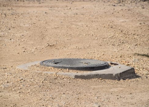 a Construction of sewer hatches. Sewer installation.
