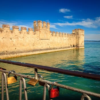 Walls of Scaligero Castle and the Lake Garda in Lombardy, Italy
