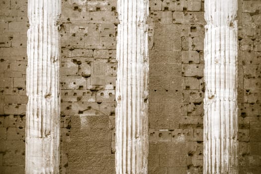 Details of columns of Temple of Hadrian facade in Rome, Italy