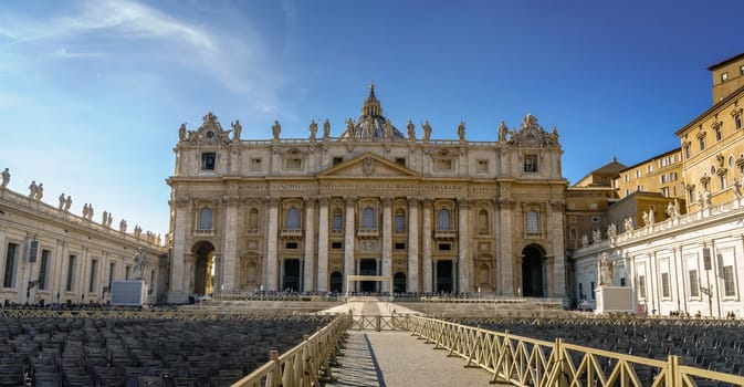 Rows of empty seats in front of St. Peters Basilica in Vatican City, Rome, Italy
