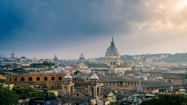 View of Rome skyline under stormy skies from Terrazza del Pincio