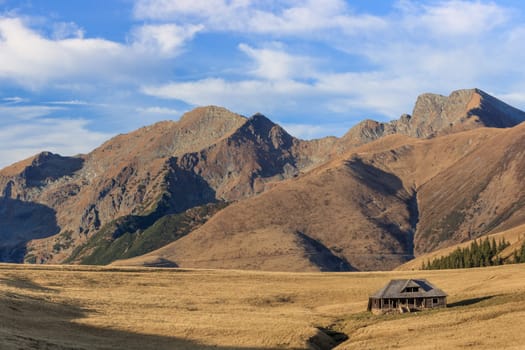 mountain landscape in Fagaras Mountains, Romania. In the background Lespezi Peak 2517m and Negoiu Peak 2535 m