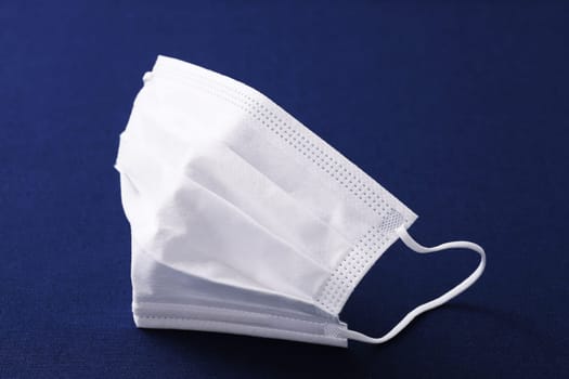 protection face mask on the dark background