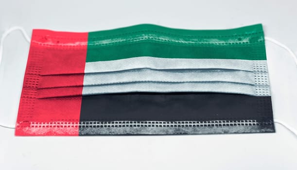 surgical mask with the national flag of Kuwait printed. Pandemic covid-19 and preventive measures to counter the spread of the virus