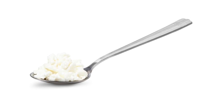 Cottage cheese in spoon isolated on white background with clipping path