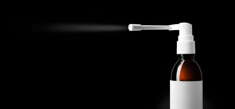 Throast spray medicine isolated on black background. With clipping path