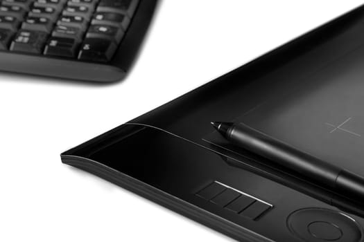 Graphic tablet with pen for illustrators and designers, isolated on white background