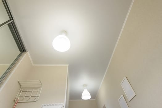 Stretch ceiling in the hallway in the apartment