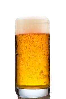 Glass of beer with foam and carboni dioxide in back lit on white
