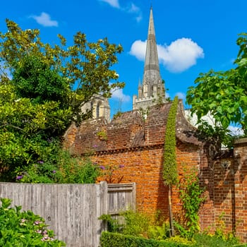 Vintage architecture with Cathedral Church of the Holy Trinity in background - Chichester, West Sussex, United Kingdom on 14 July 2019