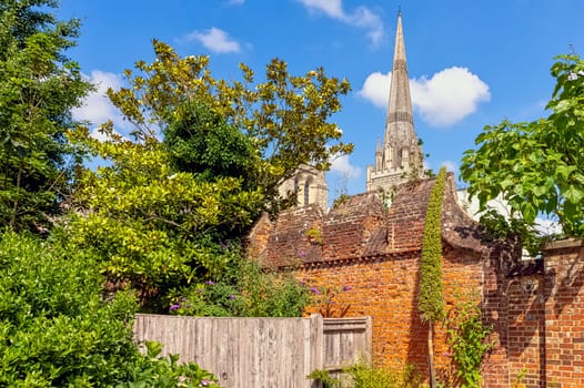Vintage architecture with Cathedral Church of the Holy Trinity in background - Chichester, West Sussex, United Kingdom on 14 July 2019