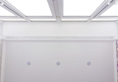 Contact of a stretch ceiling to a wide stained-glass window