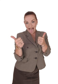 An happy businesswoman standing in a brown jacket gesturing thump.up and approving, isolated for white background.