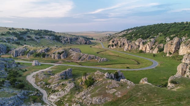 mountain landscape with some of the oldest limestone rock formations in Dobrogea Gorges (Cheile Dobrogei) Romania