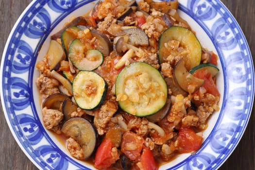 stir fry of vegetable with minced meat in a dish on table