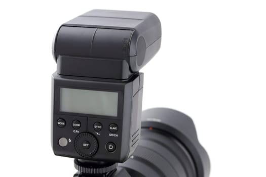 Photo camera body with flash isolated on white background