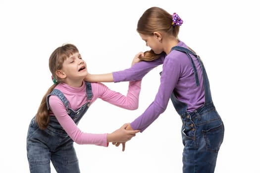 Two girls fight and hurt each other