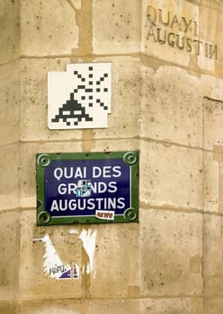 Street art. Invader. Mosaic. Quai des grands Augustins Paris 6 th arrondissement. France