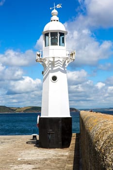 Lighthouse on the outer Harbour Wall at Mevagissey Cornwall England UK Europe
