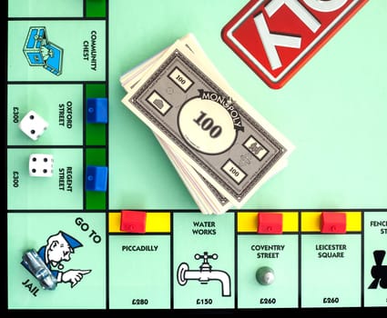 SWINDON, UK - JUNE 11, 2014: English Edition of Monopoly showing The Jail,  The classic trading game from Parker Brothers was first introduced to America in 1935.
