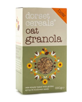 SWINDON, UK - MAY 31, 2014: Packet Of Dorset Cereals Oat Granola With  Syrup and Sunflower Seeds on a White Background