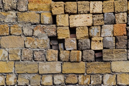 a shadow from the blocks of limestone shell. Wall texture background
