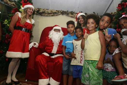 salvador, bahia / brazil - december 5, 2016: Santa Claus receives children in Noel Village, Christmas decoration mounted in the Municipal Square of Salvador city.