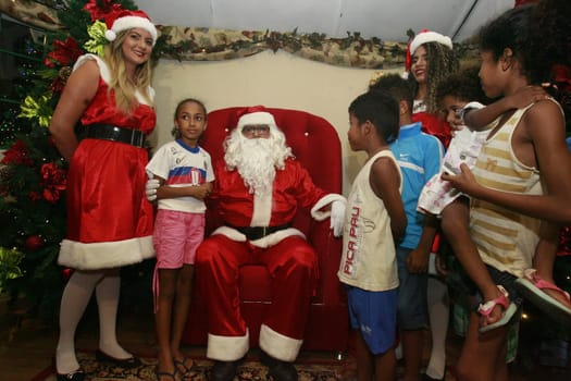 salvador, bahia / brazil - december 5, 2016: Santa Claus receives children in Noel Village, Christmas decoration mounted in the Municipal Square of Salvador city.