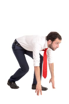 Businessman ready to run isolated against a white background