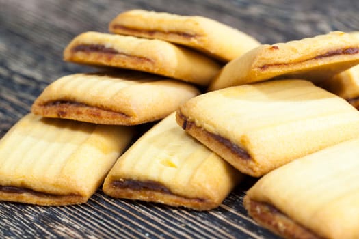 delicious and fresh soft wheat cookies stuffed with sweet fruit jam
