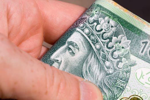 real Polish zlotys in the obverse with a portrait of the king, close-up of cash, national money of Poland