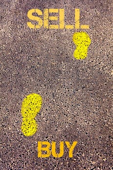Yellow footsteps on sidewalk from Buy to Sell message. Conceptual image