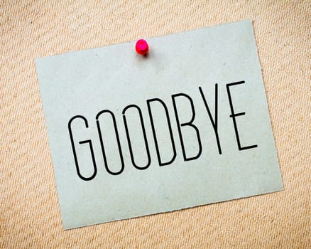Recycled paper note pinned on cork board.Goodbye Message. Concept Image