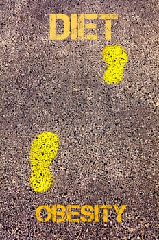 Yellow footsteps on sidewalk from Obesity to Diet message. Conceptual image